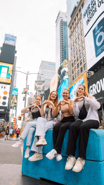 Gruppe an Au pairs am Times Square
